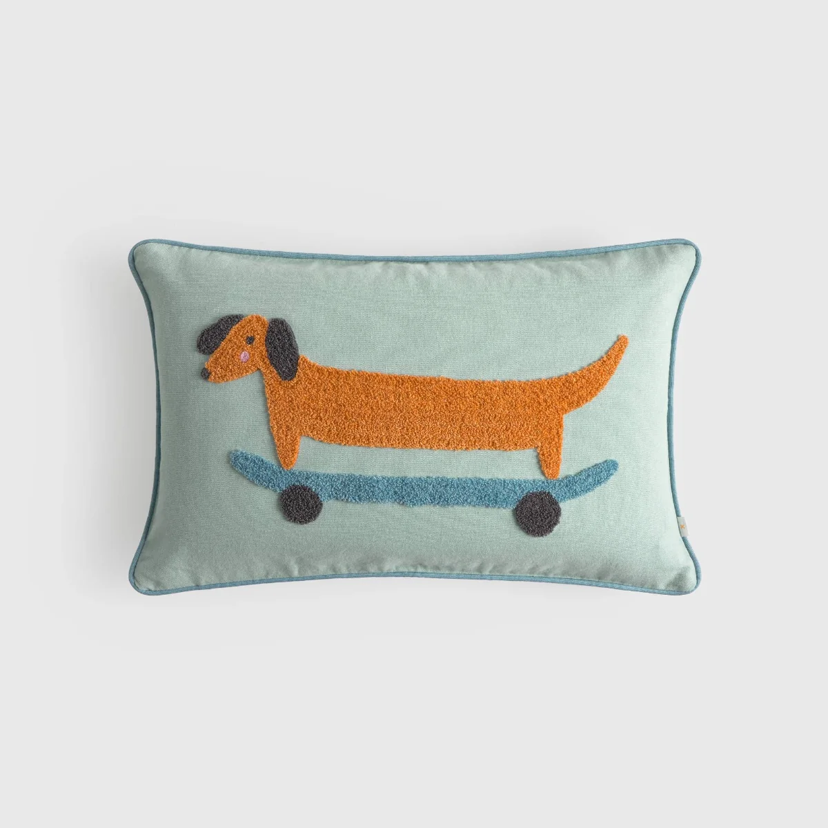 Funda de cojín de algodón perro patinete Adventure
