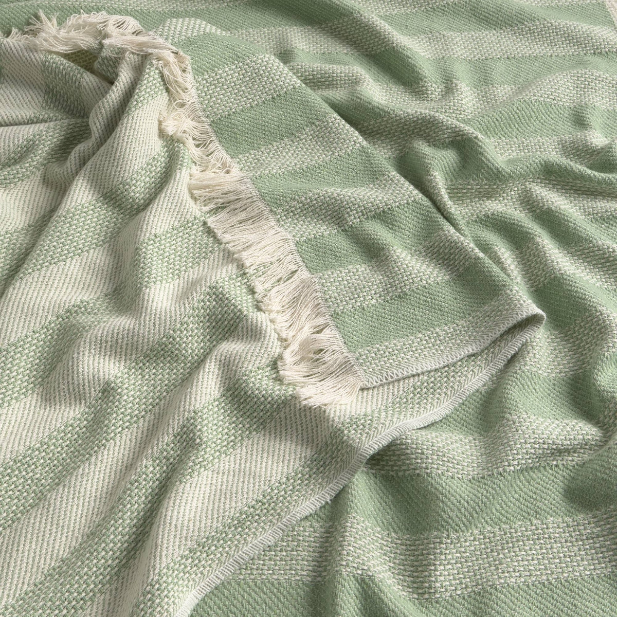 Plaid de rayas tejidas verde con flecos Primpla